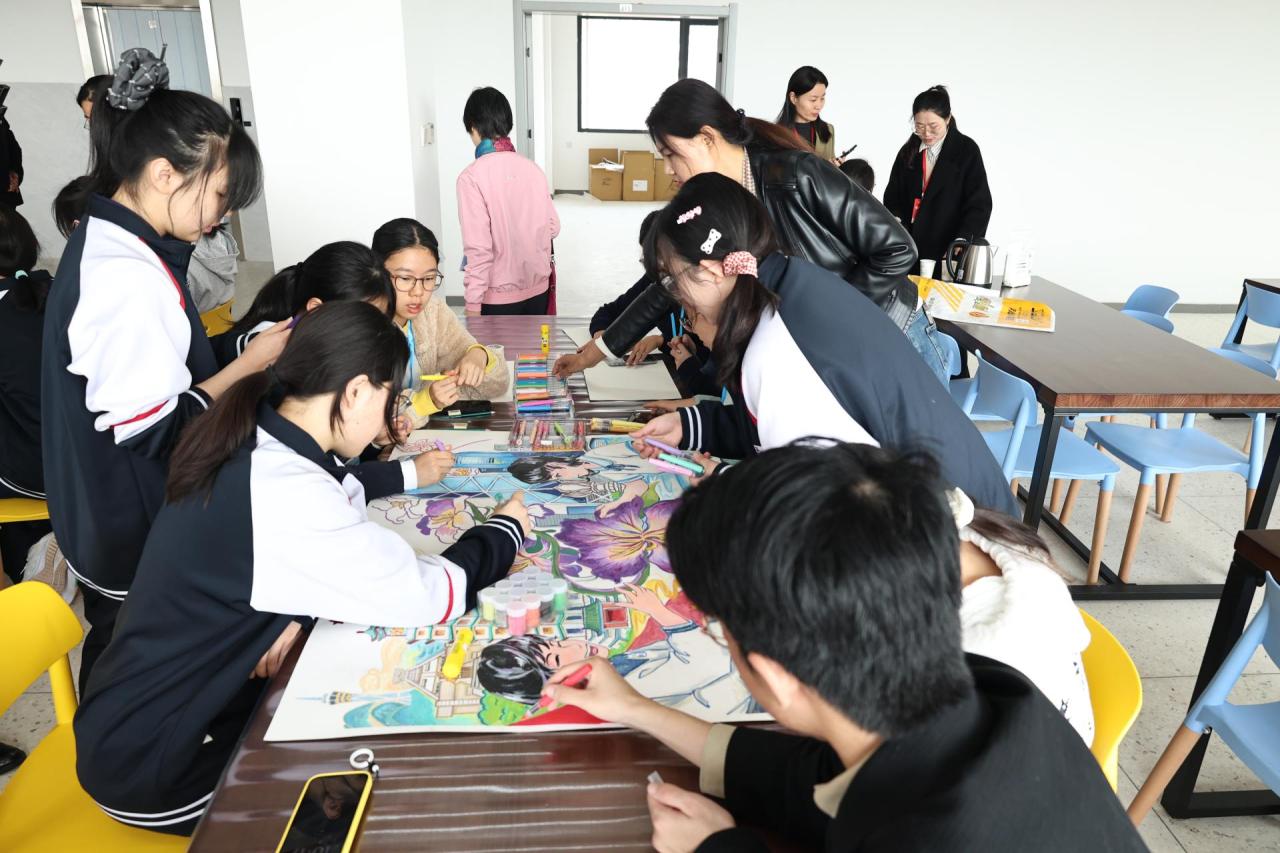 Working together to complete one shared artwork.